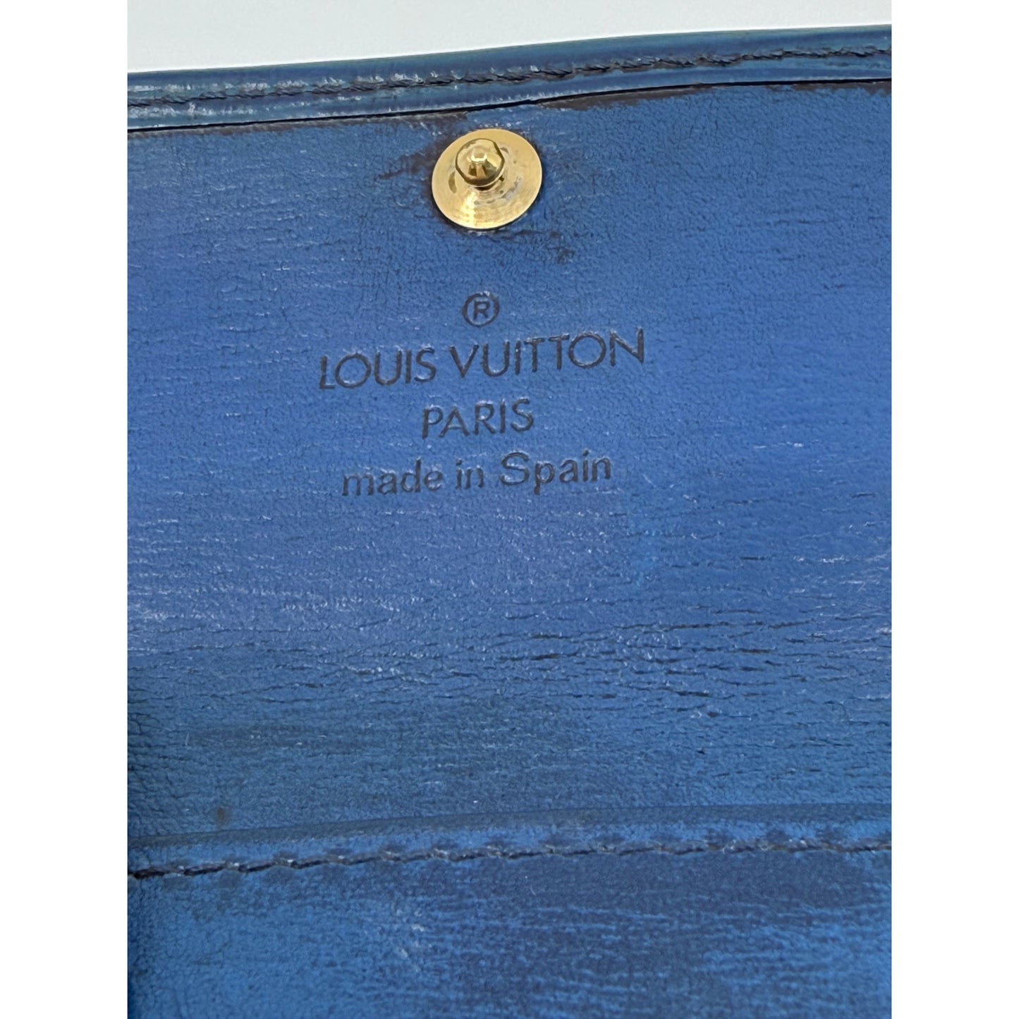 Authentic Louis Vuitton Blue Epi Leather 4-Key Holder - Classic & Functional!
